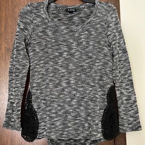 Women’s small long sleeve blouse with decorative slit sides. GREAT condition